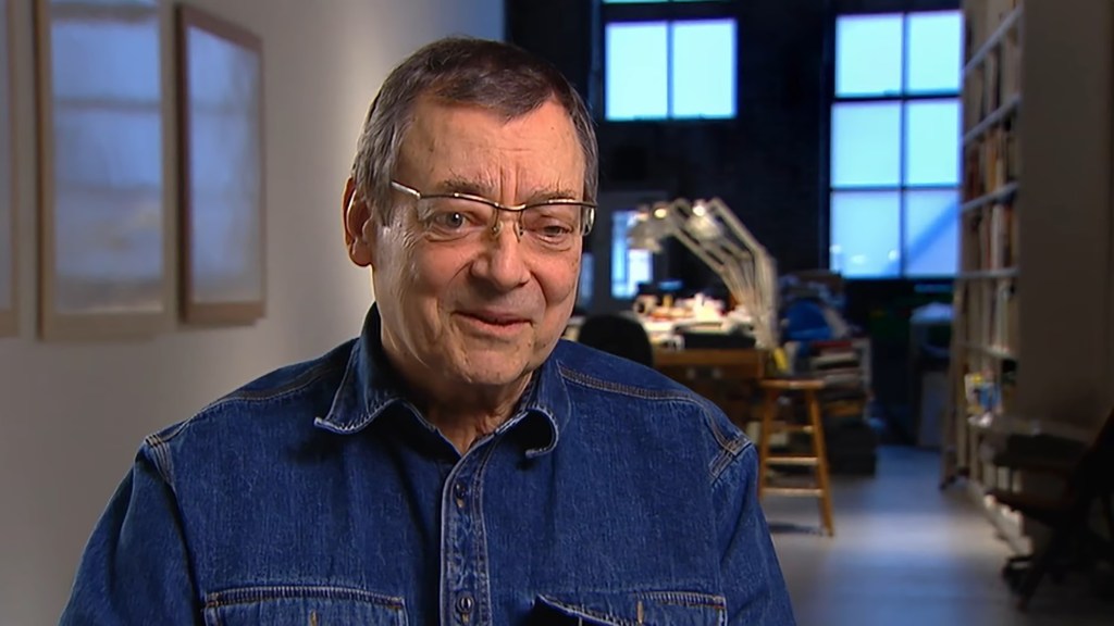 American painter Robert Ryman with glasses and a denim shirt